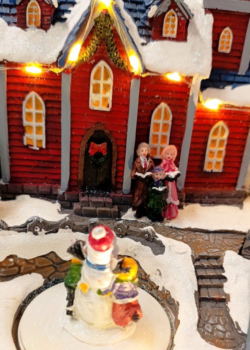 Casa Invernal con Pista de Hielo Multicolor