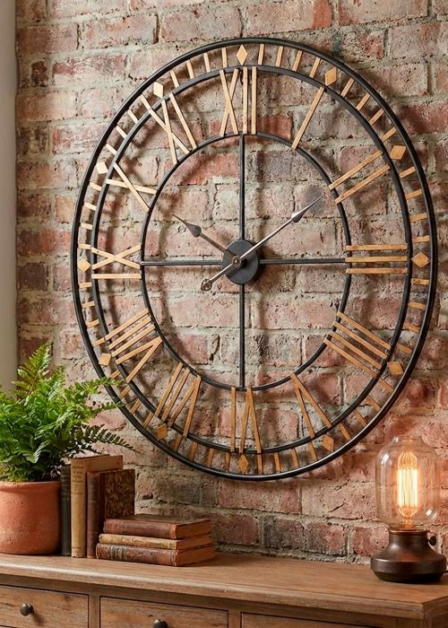 Reloj de pared estilo industrial dorado Neutro